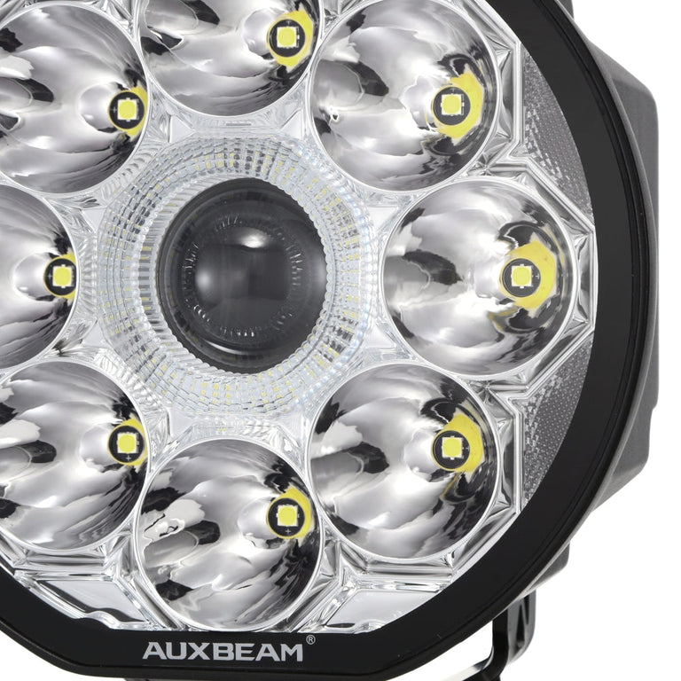 Close-up of the Auxbeam 360 Ultra 6-inch LED light lens showing the center projector and surrounding spot LED reflectors
